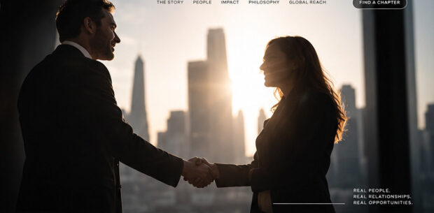 Two professionals shaking hands in front of a sunlit city skyline