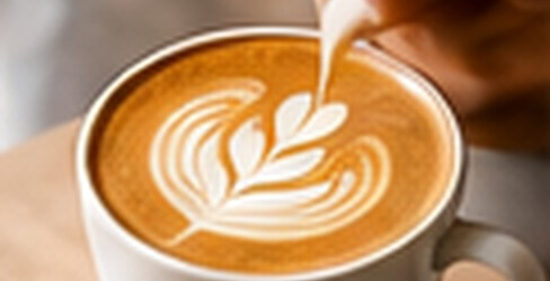 Milk poured into a latte with leaf-like latte art, AI-generated concept.