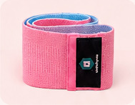 Pink textile resistance band rolled with blue trim visible inside